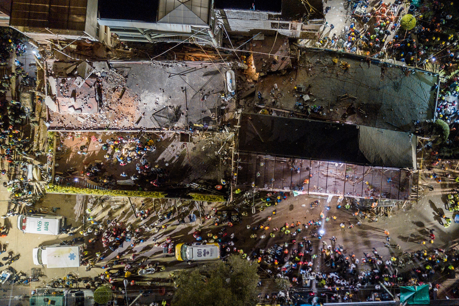 Volunteers and rescue workers search for children trapped inside Mexico City’s Enrique Rebsamen school after the earthquake.