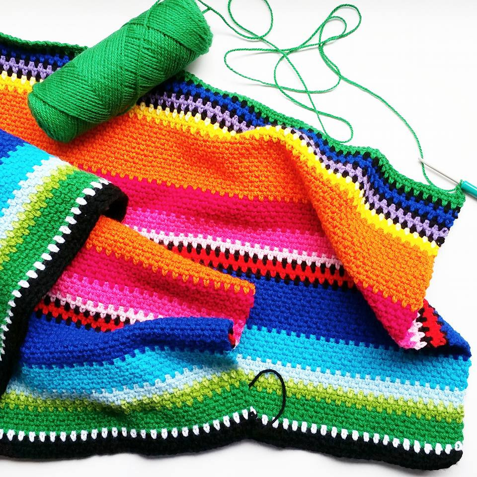 Close up of the vibrant colors in the crochet Mexican blanket