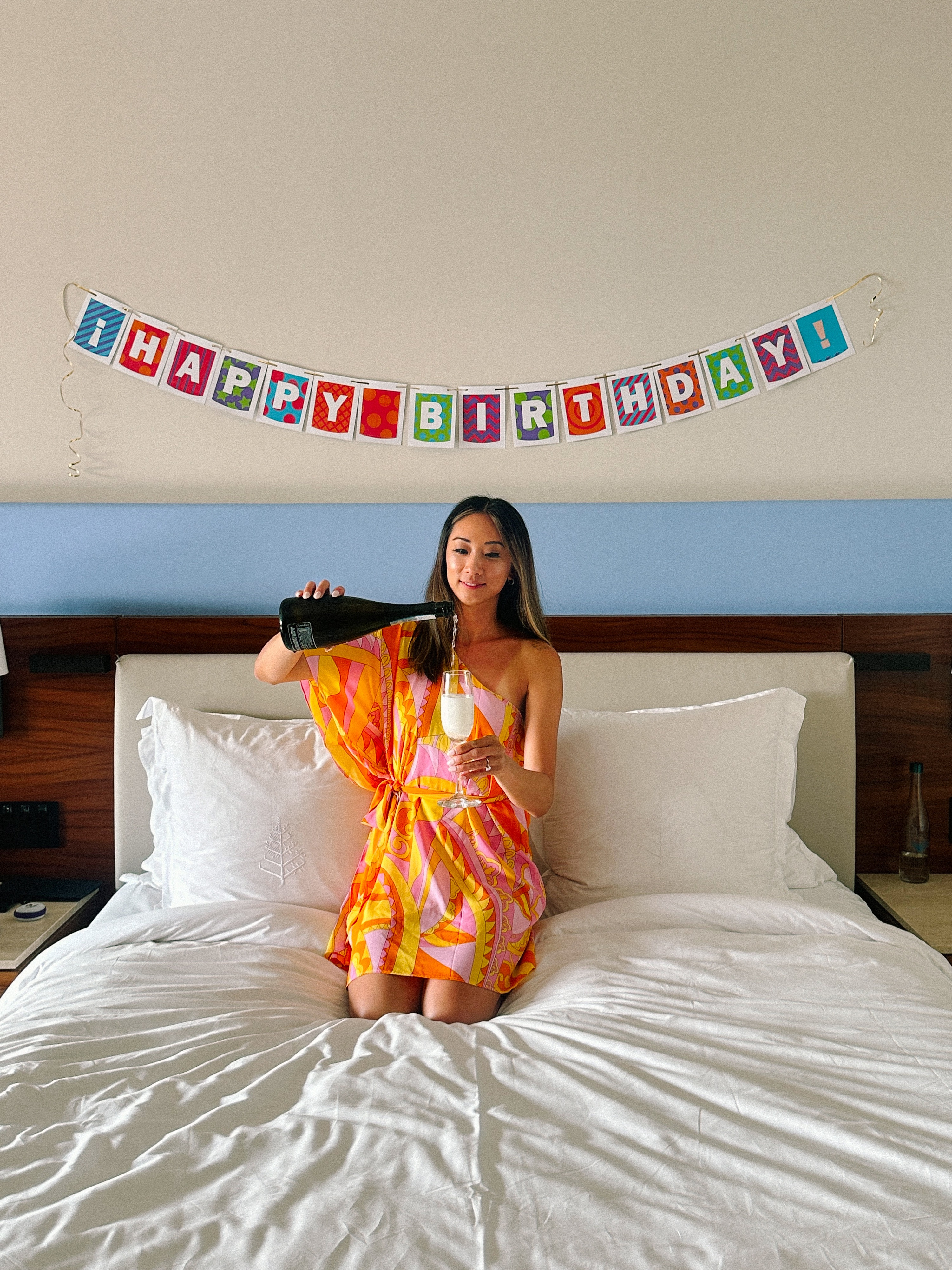 Birthday champagne and banner in room at Four Seasons Resort Punta Mita