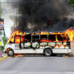 Mexican authorities in armored vehicles during a cartel clash in Culiacan following the arrest of Ovidio Guzmán