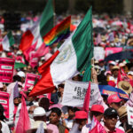 Claudia Sheinbaum celebrating her presidential victory in Mexico City's Zocalo.