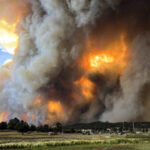 Image: Smoke rises from fires in Ruidoso, N.M.,