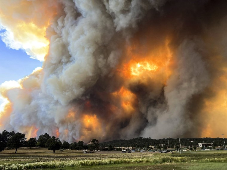 Image: Smoke rises from fires in Ruidoso, N.M.,