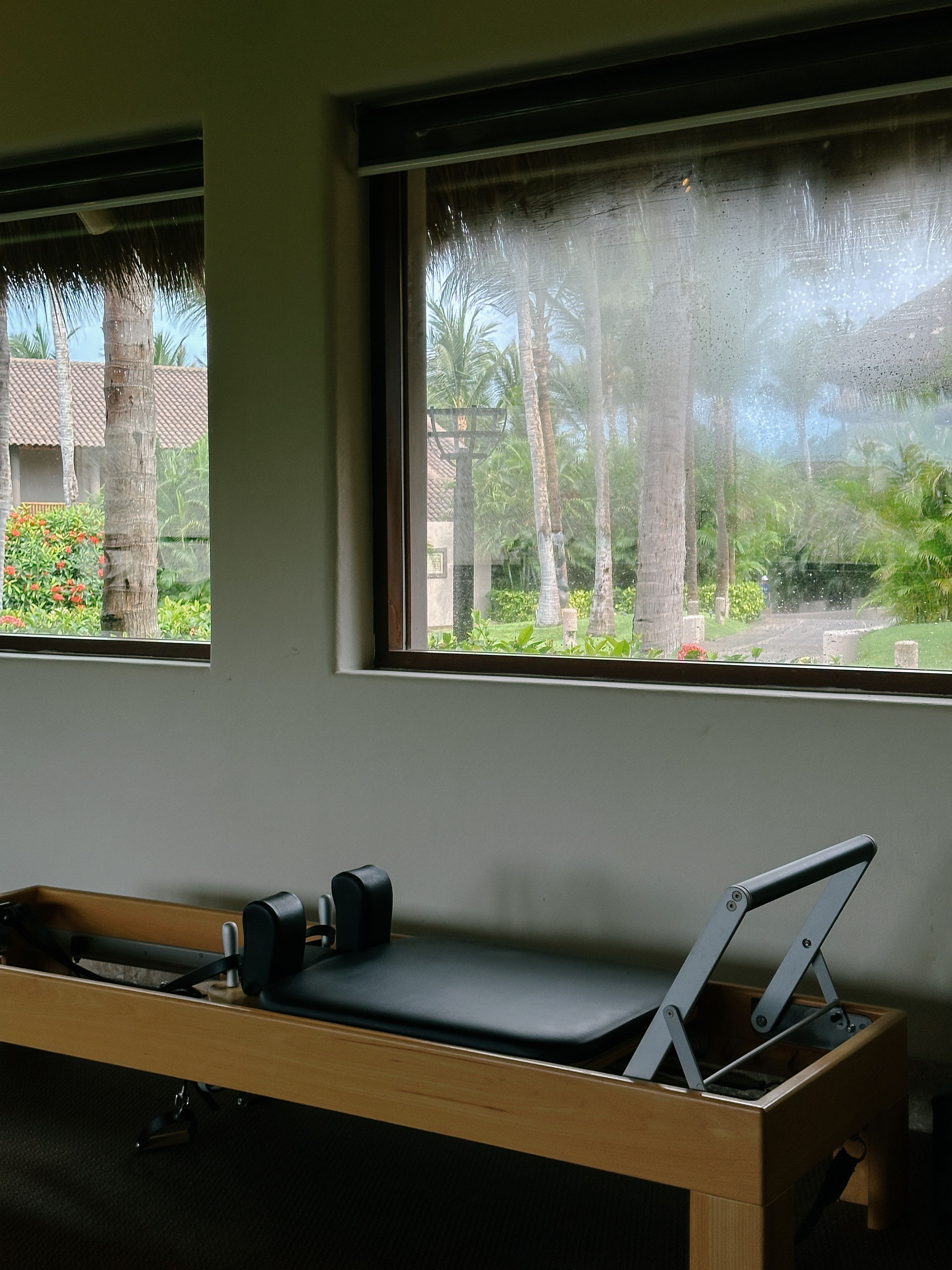 Gym interior with reformer pilates machine at Four Seasons Resort Punta Mita