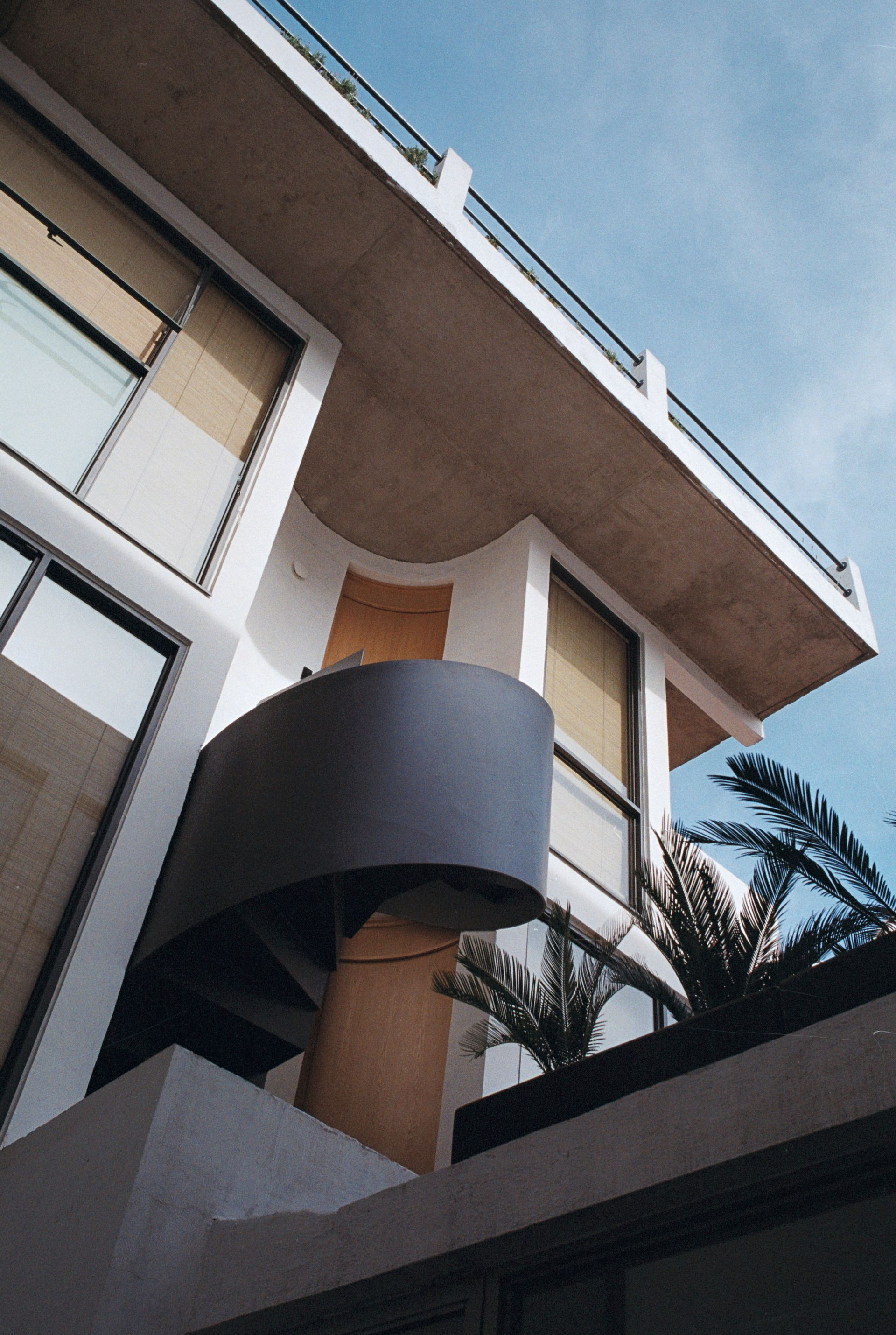 Exterior view of Casa Pani guest house in Mexico City, showcasing a modern staircase and architectural design