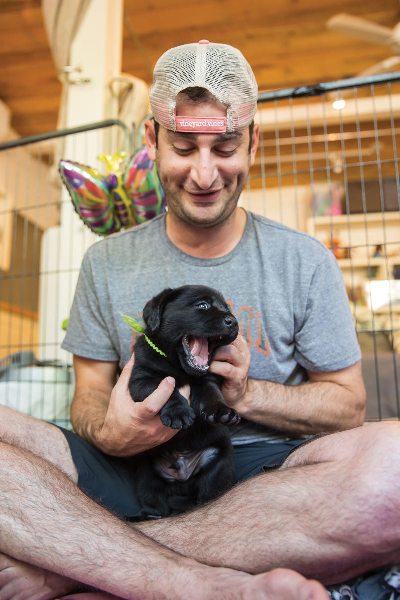 A humorous close-up photo of a sign that reads &quot;WARNING: You cannot take the puppies home.&quot; at the New Mexico resort, emphasizing the adorable puppies in the Canine Play class are not available for adoption.
