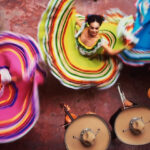Folkloric dancers in vibrant costumes