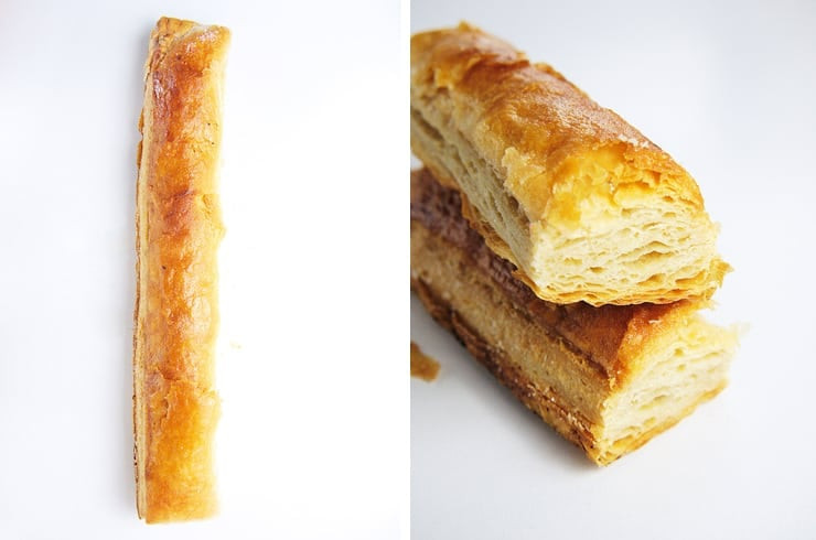 A close-up of Banderilla pan dulce, showcasing its flaky layers and glistening sugar glaze.