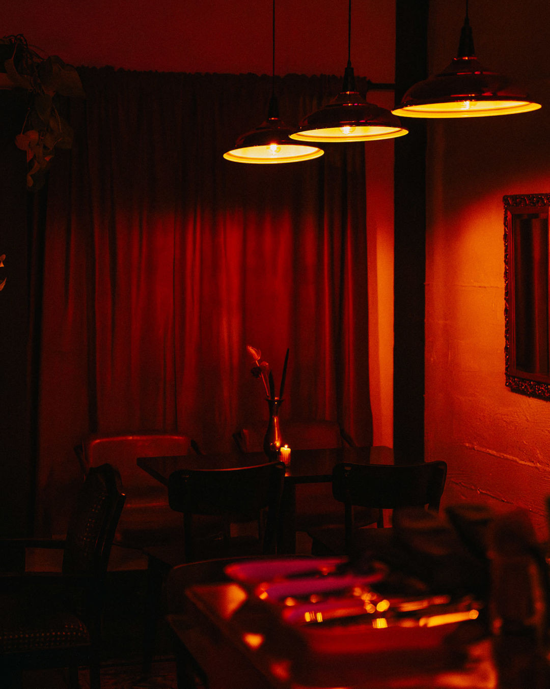 Bar Comala's dimly lit interior creating an inviting atmosphere for enjoying Mexican spirits in Portland.