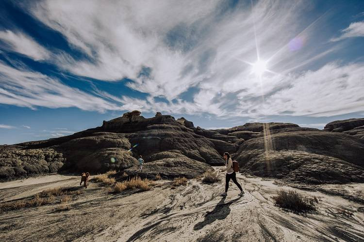 Panoramic view of Bisti Badlands under a vast sky
