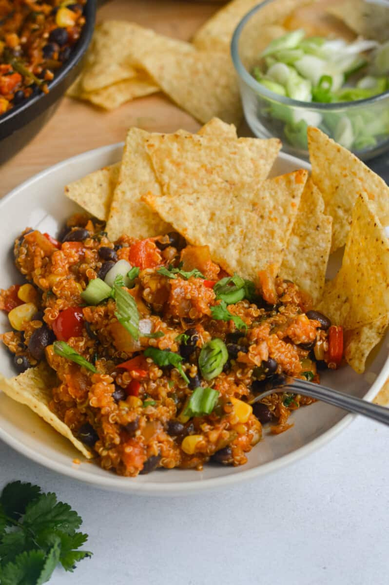 Bowl of taco skillet served with chips.