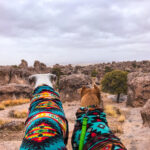 Dogs enjoying the unique rock formations at City of Rocks State Park, New Mexico