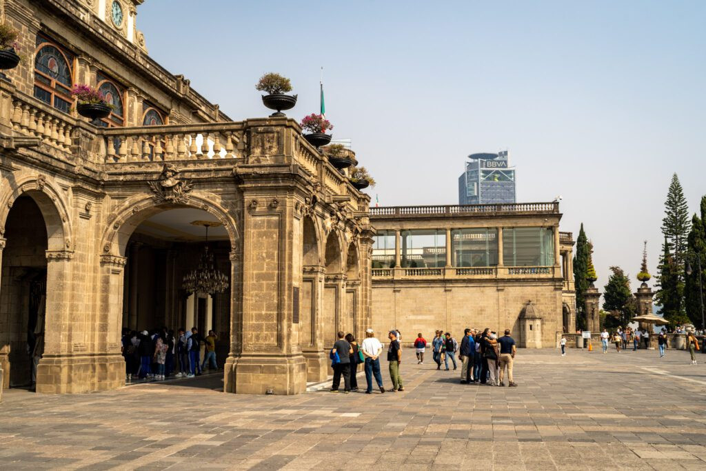 Chapultepec Castle perched atop a hill in Chapultepec Park, offering a view of the city skyline.