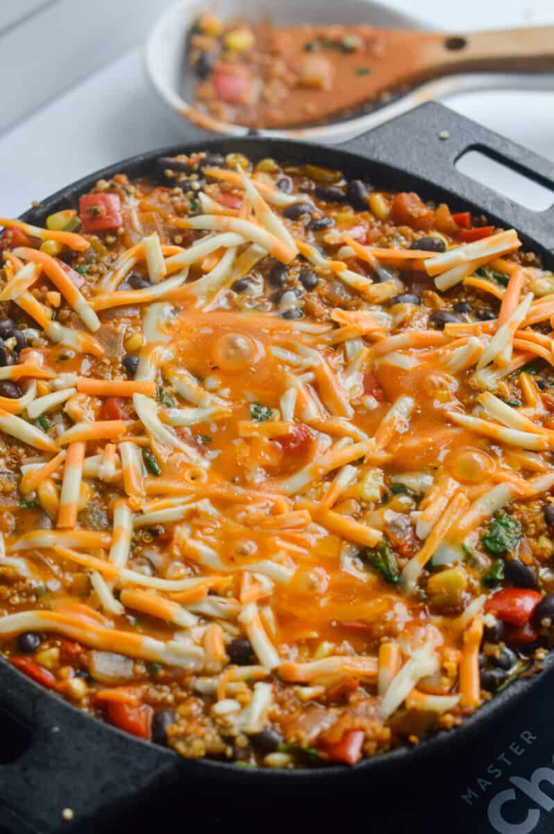 Vegetarian mexican taco skillet with melted cheese.