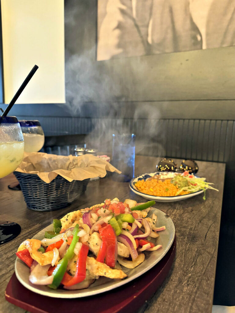 Sizzling Chicken Fajitas with fresh pico de gallo at El Milagro Mexican restaurant in Omaha