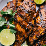 Image of marinated chicken in a bowl, ready for grilling, showcasing the vibrant colors of the marinade