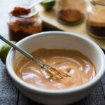 Close-up of creamy Mexican Mayo in a bowl, highlighting its texture and inviting color.