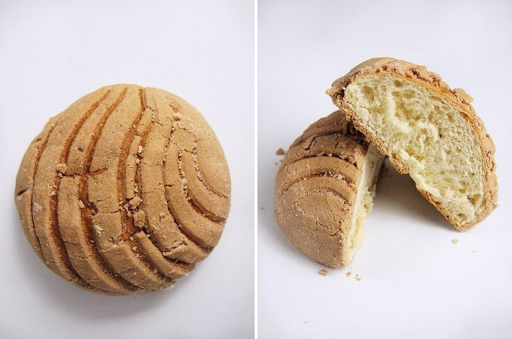 A close-up of chocolate Conchas, highlighting the signature seashell pattern and soft, brioche texture.