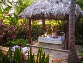 Woman meditating at a spa in Cabo San Lucas