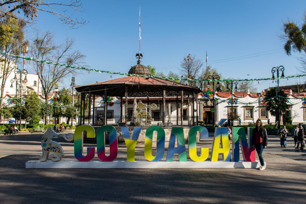 A decorative Coyoacán street sign, adding to the neighborhood's charming village atmosphere.