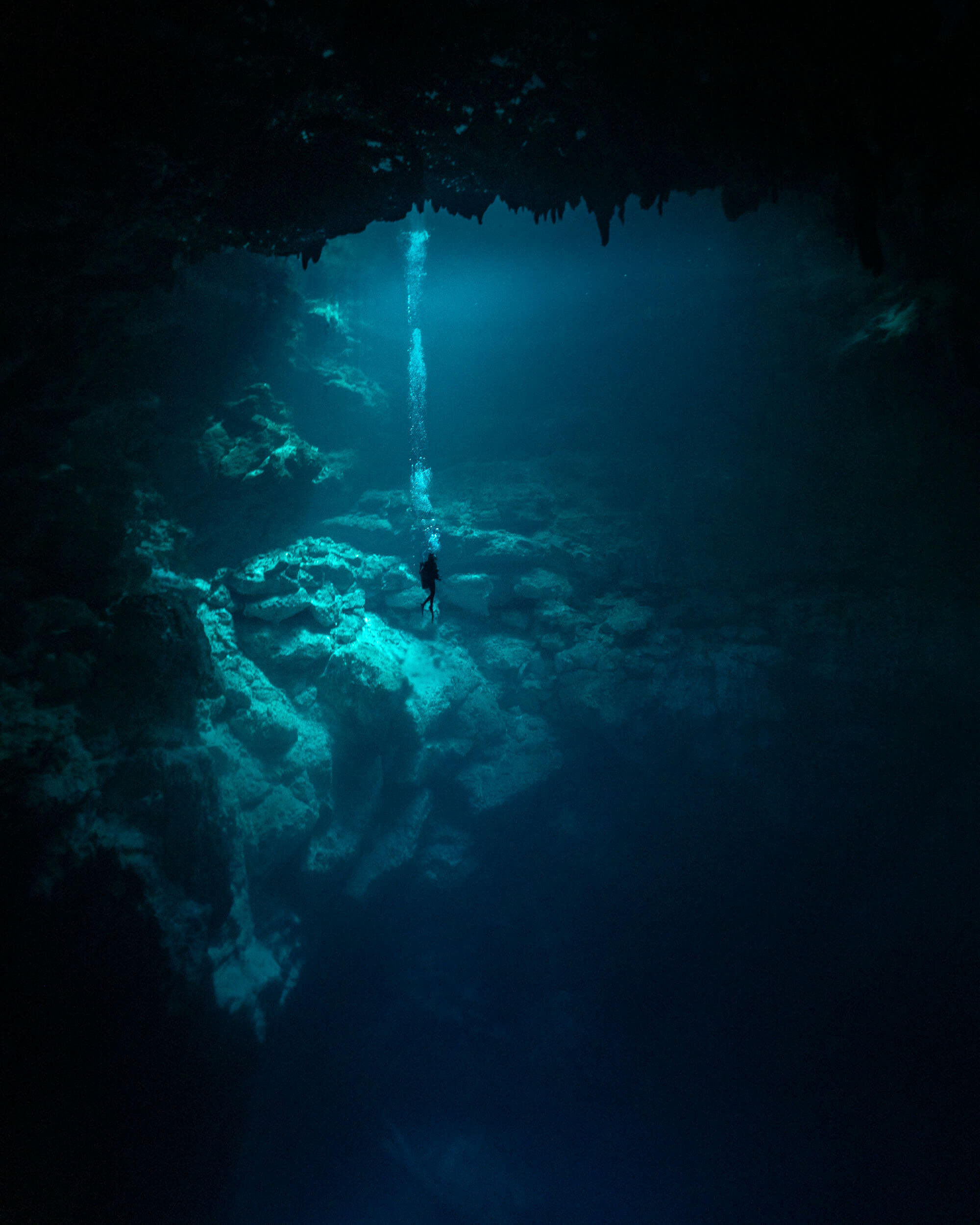 Scuba diving in El Pit Cenote, Yucatan Peninsula, Mexico, a truly unforgettable highlight for experienced divers.