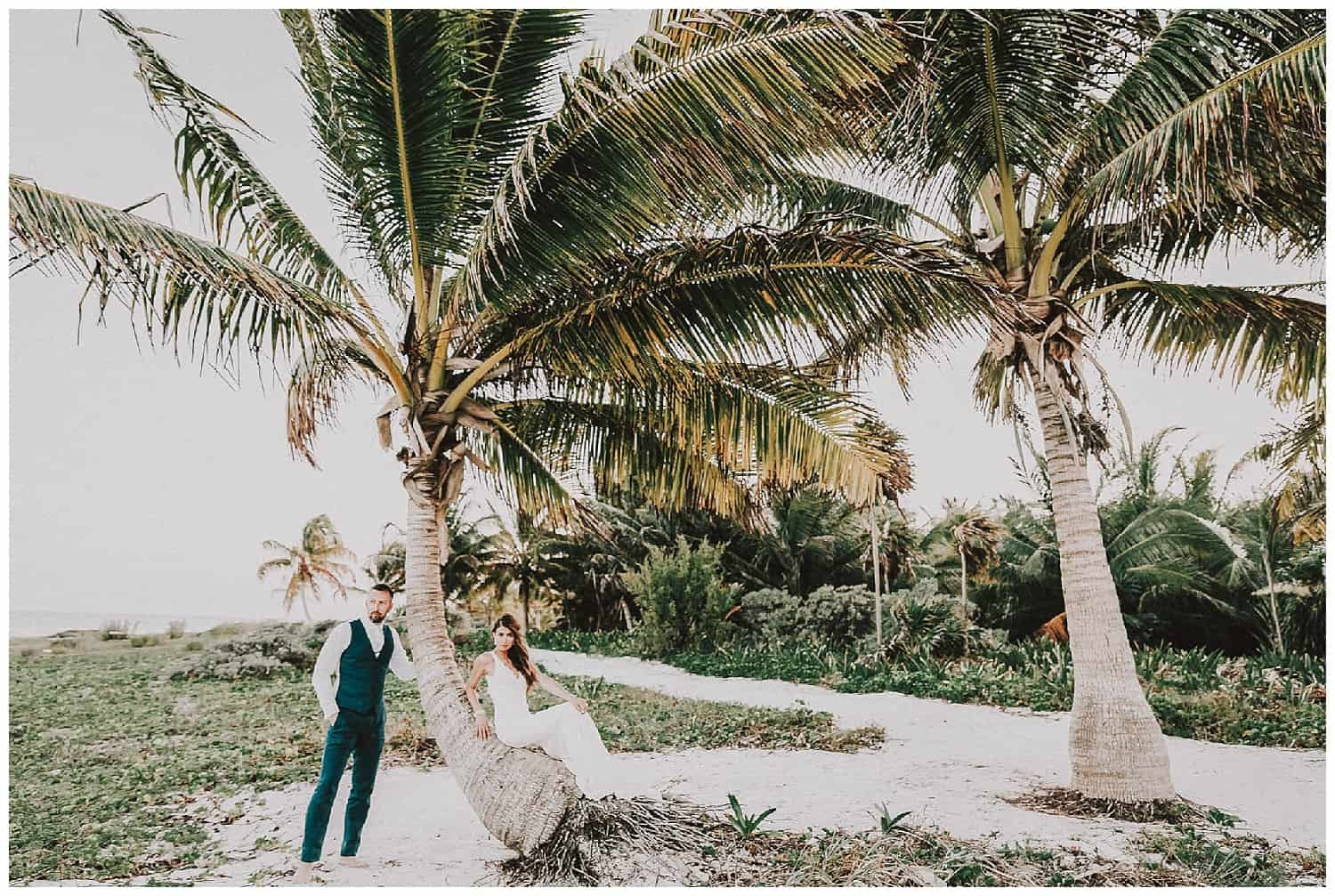 Romantic couple walking on the beach at Dreams Tulum Mexico.