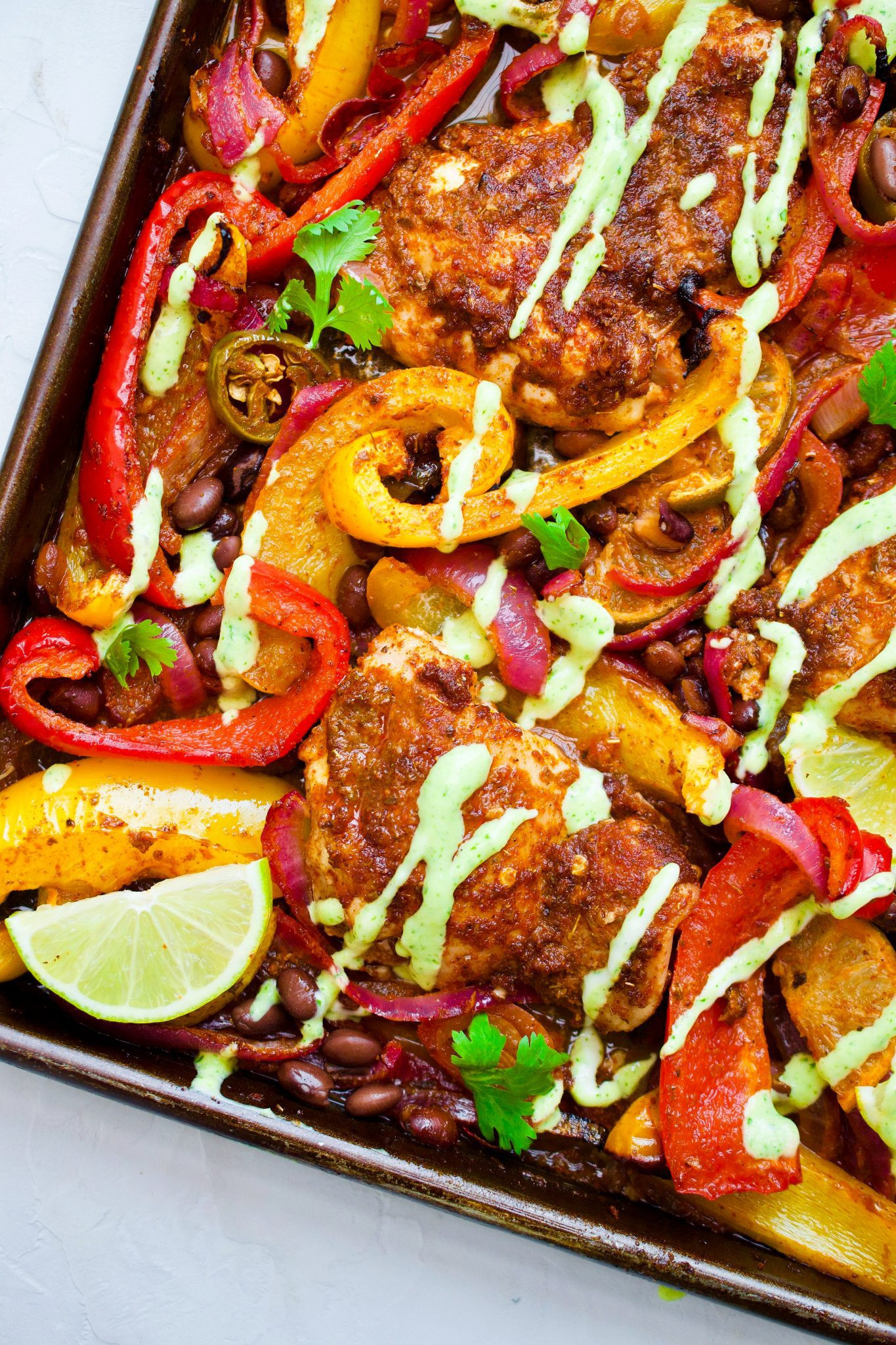 Close-up of Sheet Pan Mexican Chicken and Veggies with Green Sauce