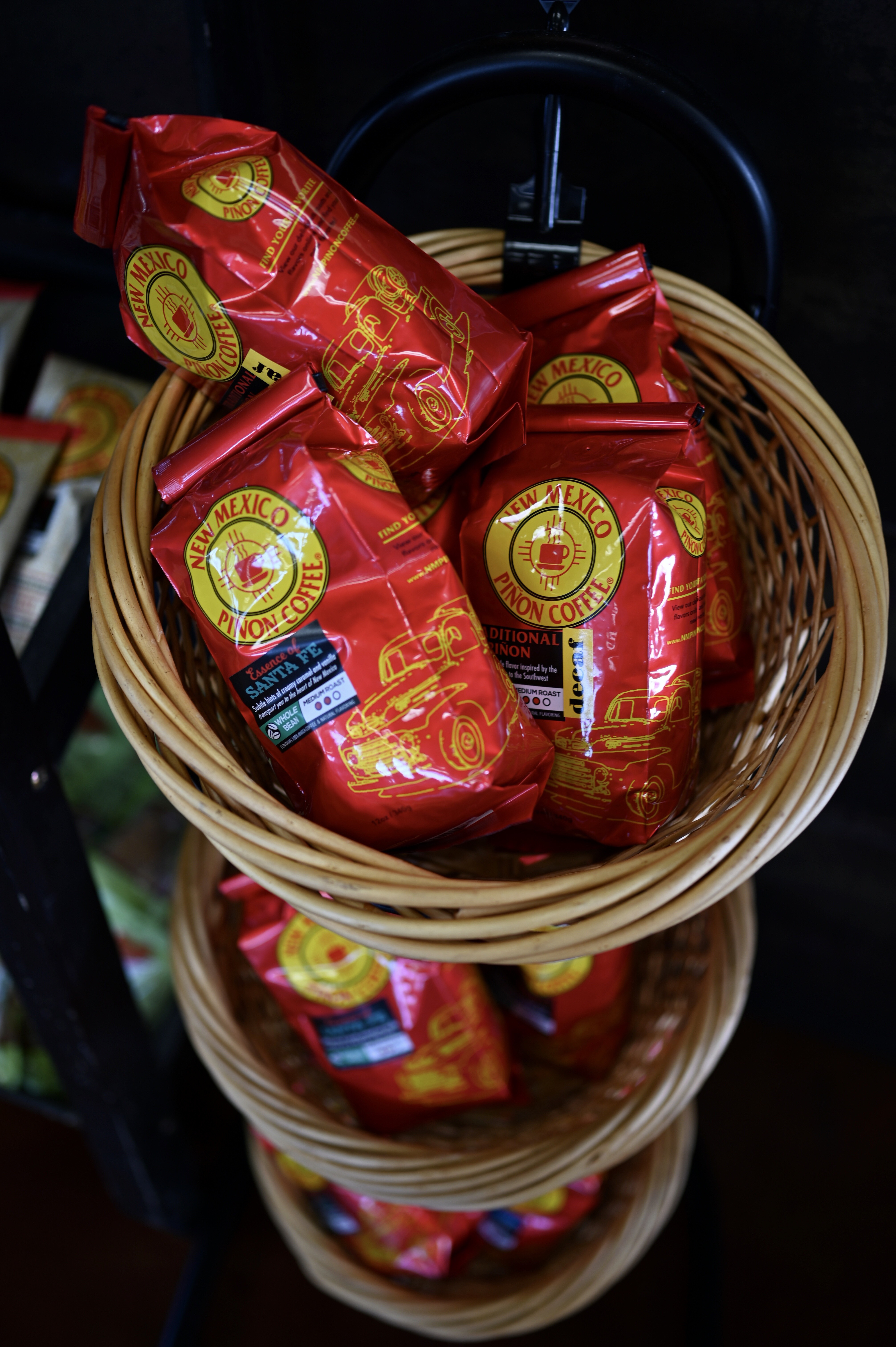 Bags of New Mexico Piñon Coffee beans available for purchase at Piñon Coffee House.