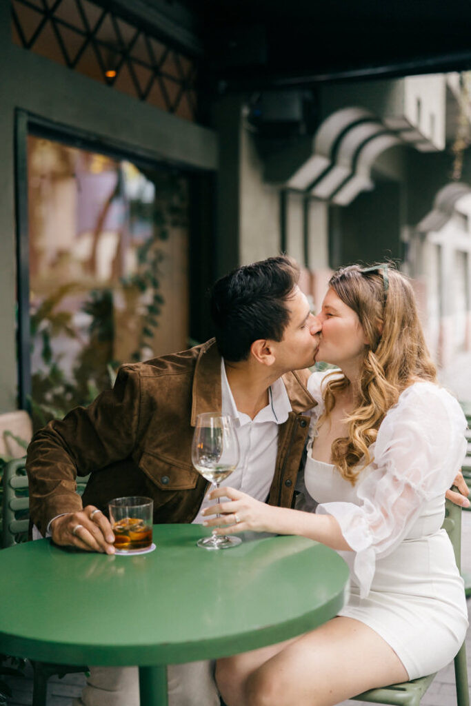 Mexico City engagement pictures: A loving couple shares an intimate moment amidst the charming streets of Roma Norte