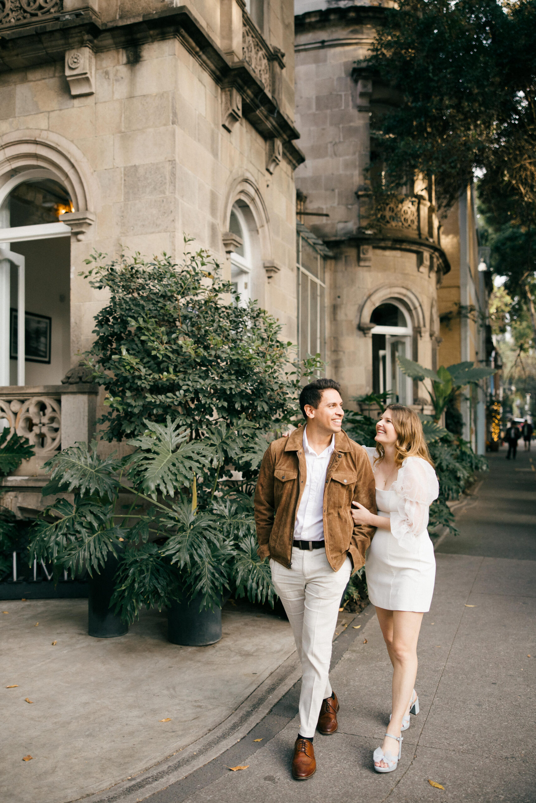 Romantic walk mexico pictures: A beautiful couple enjoys a romantic walk through Mexico City, capturing the city's charm and their connection