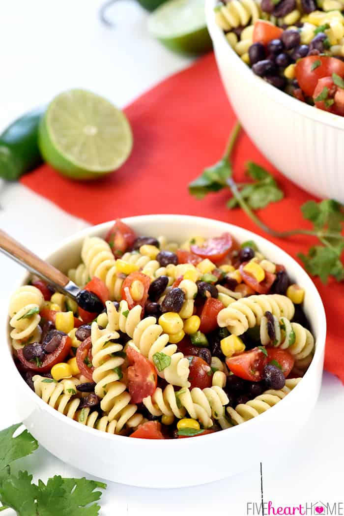 A vibrant and colorful bowl of Mexican Pasta Salad ready to be served, showcasing its appetizing appearance.