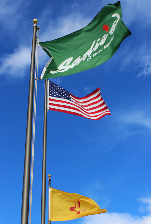 Flags representing the USA and New Mexico at Sadie's of New Mexico, Albuquerque landmark