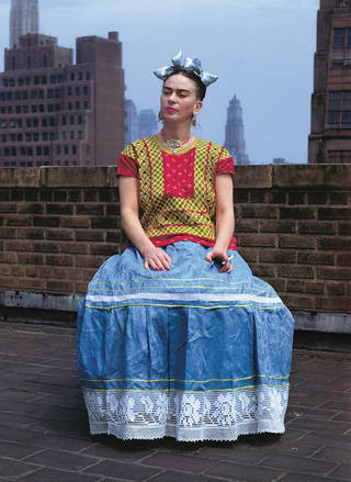 Frida Kahlo wearing Tehuana clothing in a New York rooftop photo