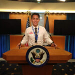 Edgar Mejia at a podium