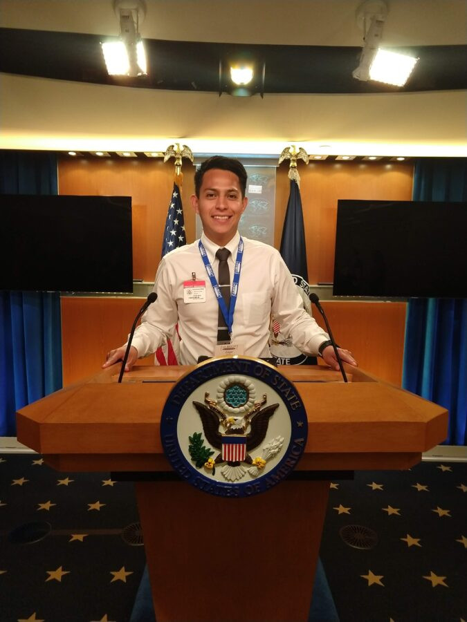 Edgar Mejia at a podium