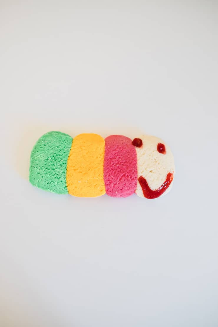 Colorful caterpillar galletas, showcasing the whimsical and playful side of Mexican cookies.