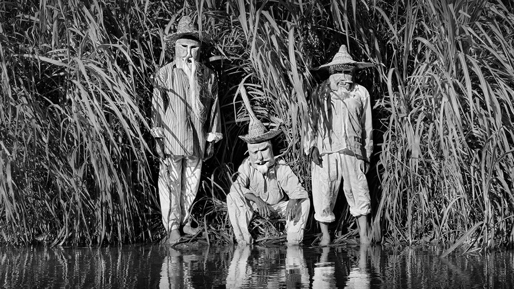 Men working at salt pans in the 'White' section of Gods of Mexico