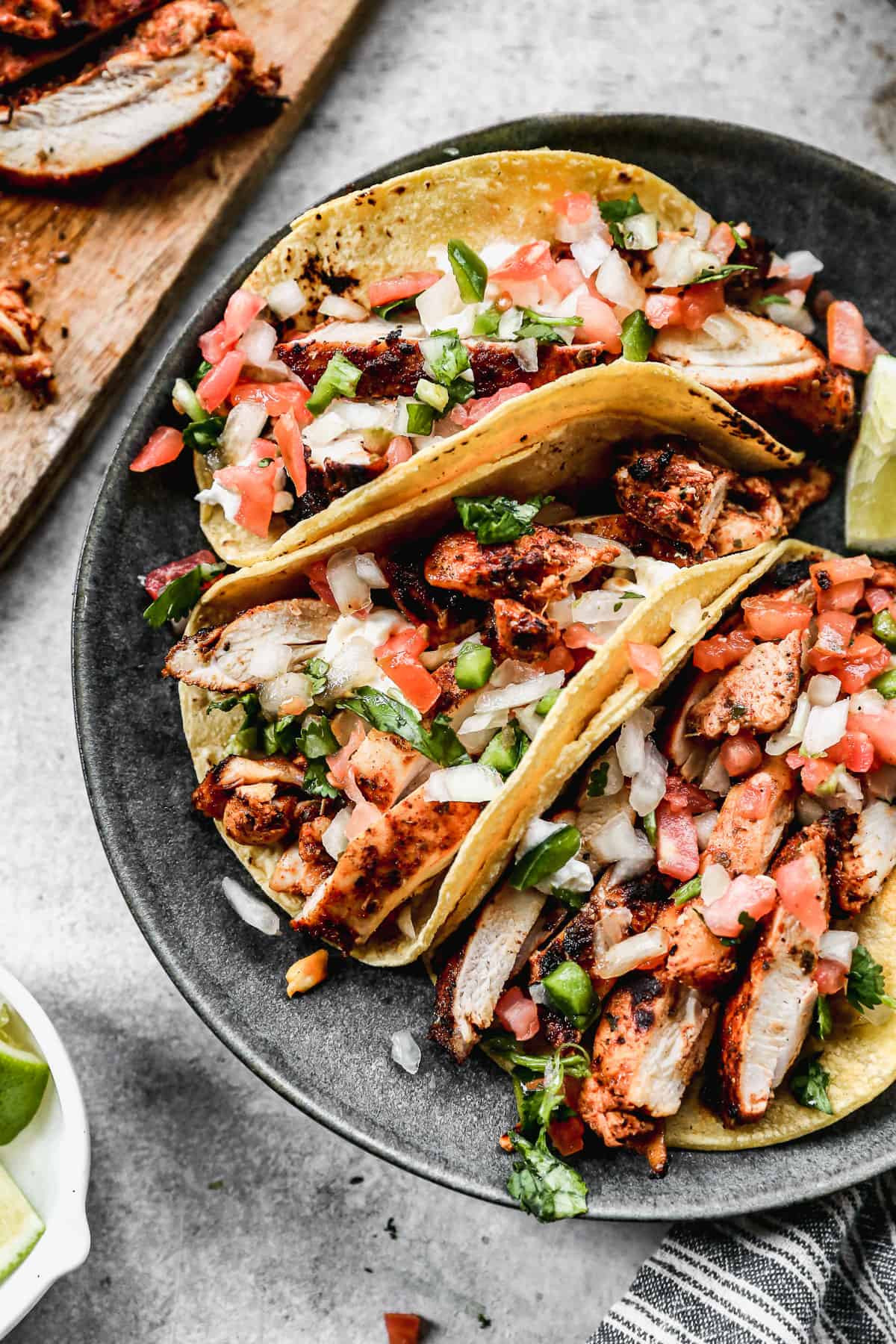 Authentic Mexican chicken street tacos served with pico de gallo and cilantro.