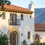 Hacienda Style Home with Courtyard and Lush Greenery