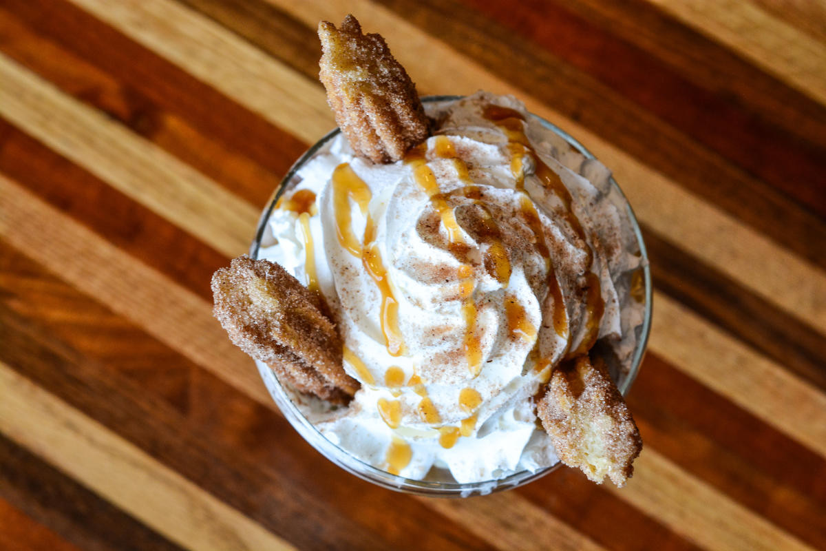 Cien Agaves restaurant dessert churro sundae with ice cream and toppings