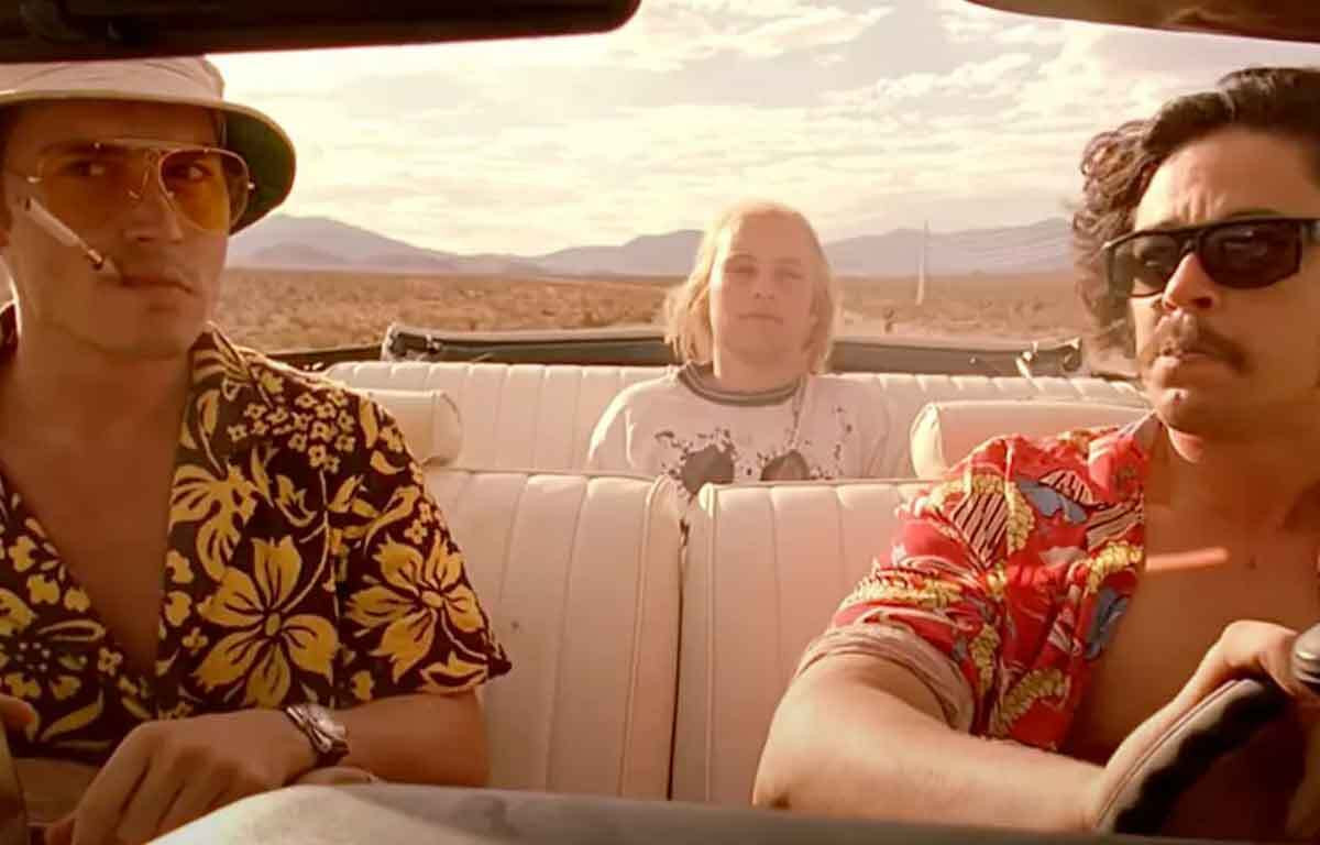 A scene inspired by Fear and Loathing in Las Vegas, humorously depicting the wild, unpredictable nature of a Mexico surf trip.