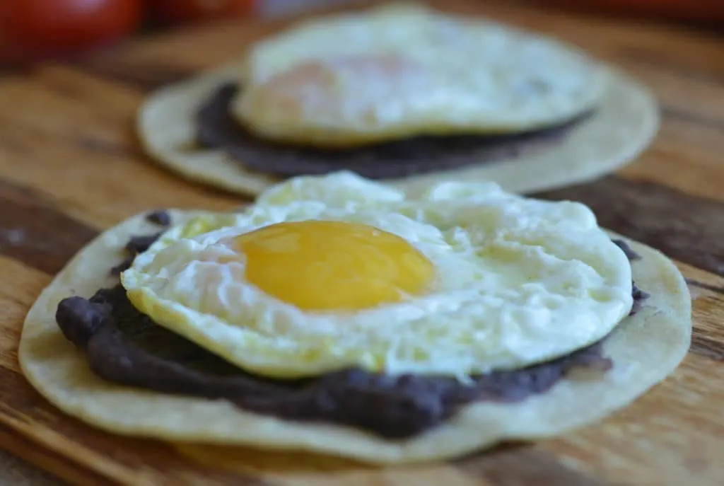 Finished Huevos Rancheros dish, showcasing the complete and delicious Mexican breakfast with all components ready to enjoy.