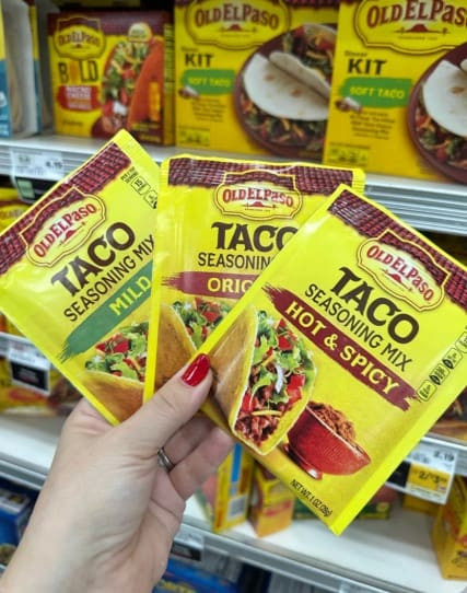 Selection of spicy ingredients for Taco Bell Mexican Pizza: hot taco seasoning, jalapenos, and pepper jack cheese.