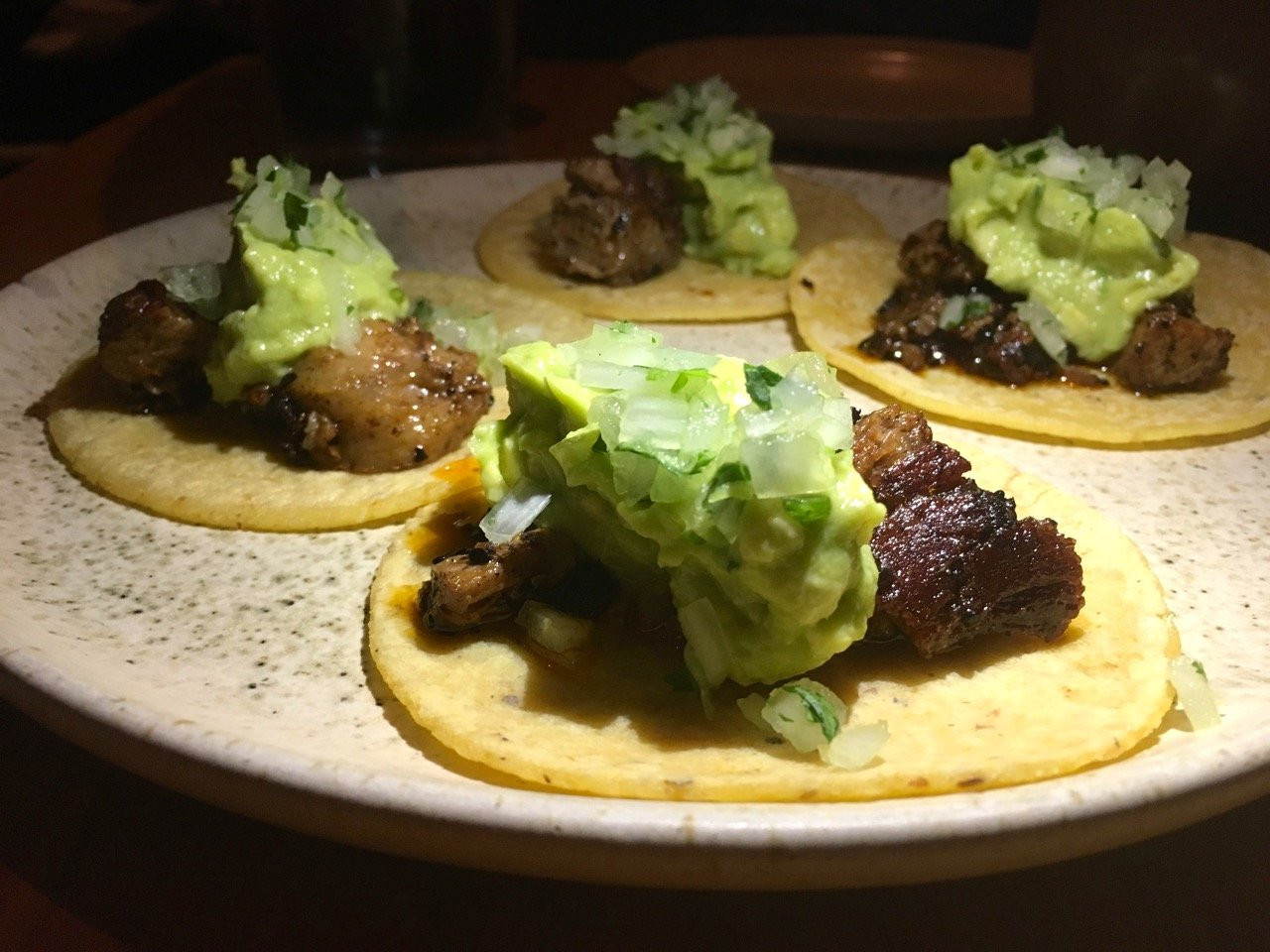 Delicious gluten-free tacos at Suerte restaurant in Austin, known for its innovative cuisine