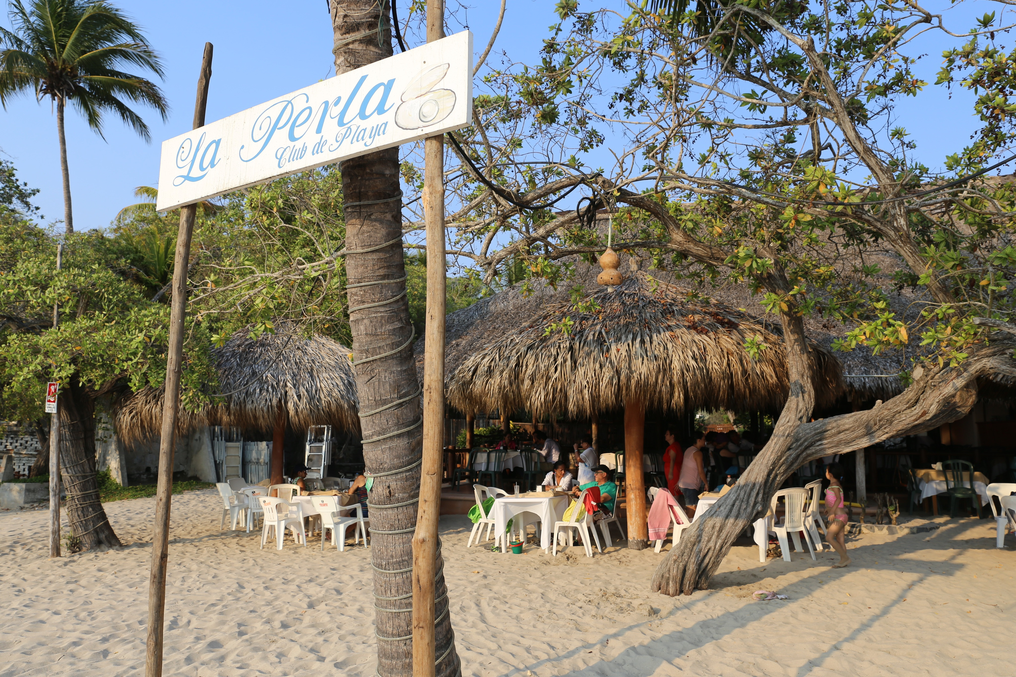 La Perla beachfront restaurant sign in Zihuatanejo, Mexico