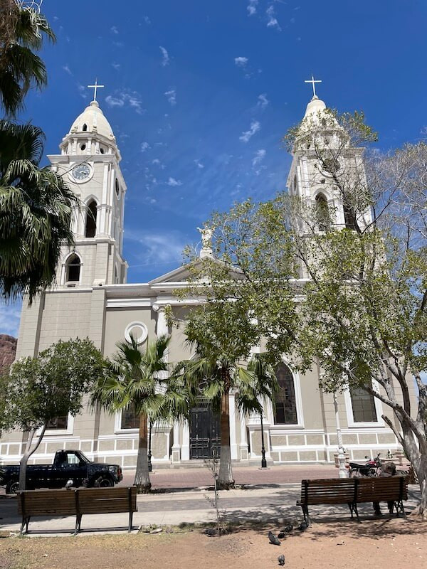 Downtown street scene in Guaymas, Mexico with historic buildings