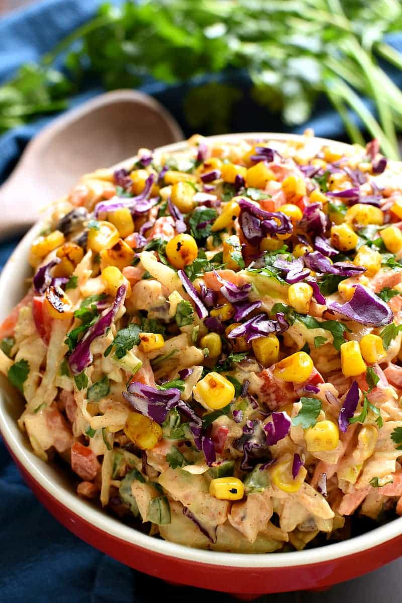 A serving of Mexican Coleslaw on a plate, showcasing its vibrant colors and the perfect creamy texture, ready to be enjoyed as a side dish.