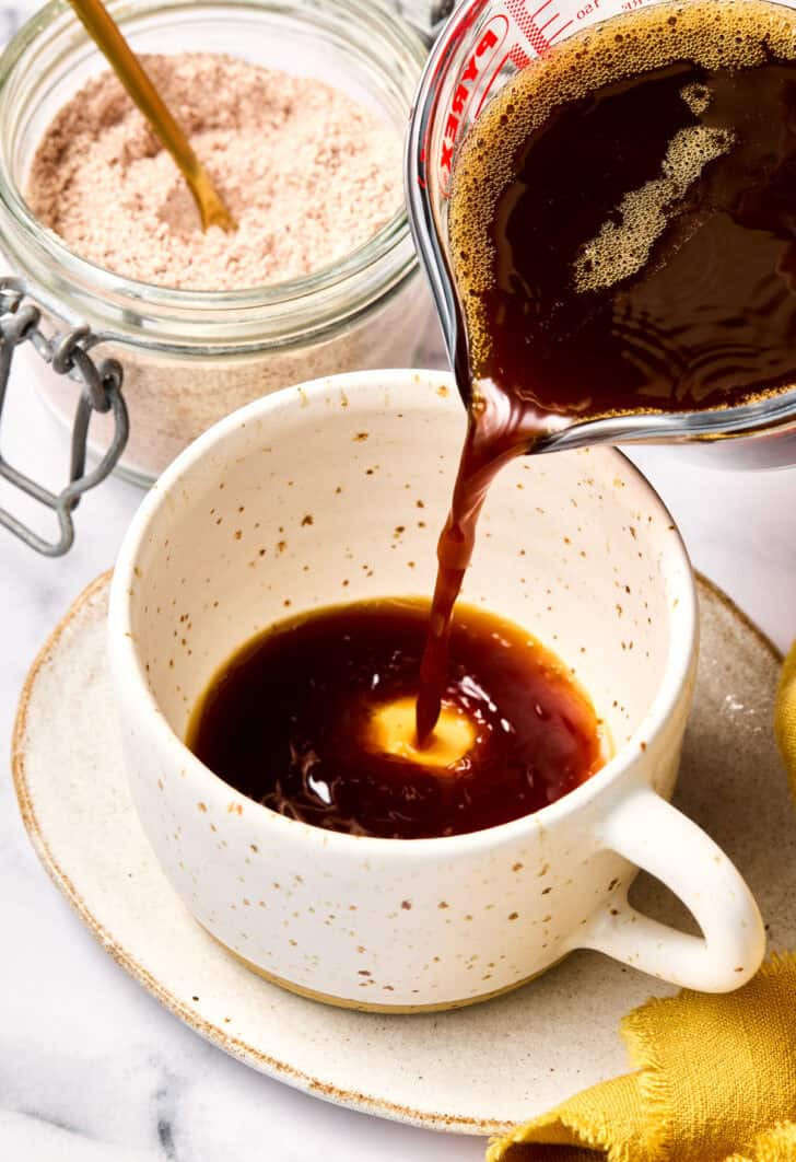 Pouring Mexican Coffee into a cup