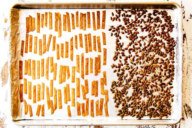 Baking sheet with homemade tortilla strips and chili-roasted pepitas for Mexican Salad