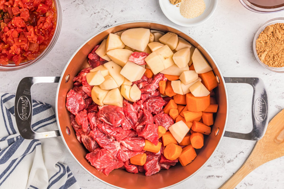 Mexican stew in a pot before baking